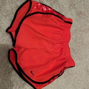 Coral Nike shorts